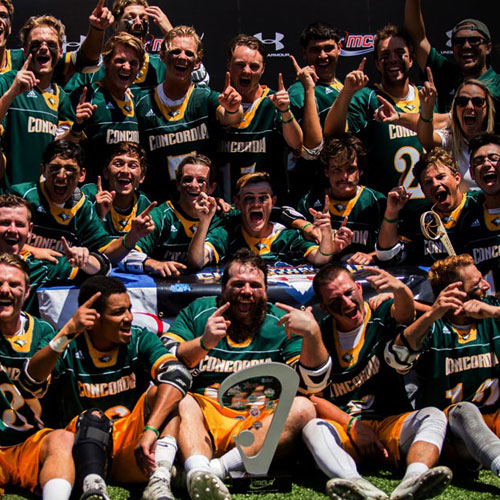 Men's Lacrosse team with trophy